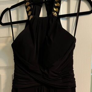 Like new, sleeveless, backless gown